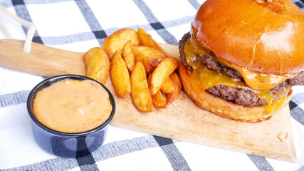 Hamburger and fries on a table
