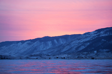 Lake Baikal, winter nature. Cape Uyuga sunset landscape