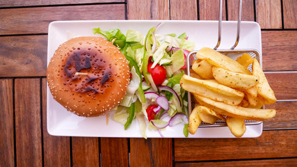Hamburger and fries on a table