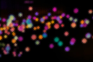 Naklejka premium Blurred colorful light abstract bokeh background.