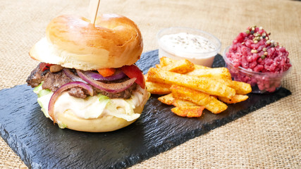 Hamburger and fries on a table