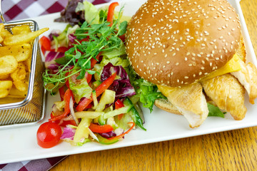 Hamburger and fries on a table