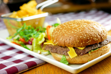 Hamburger and fries on a table