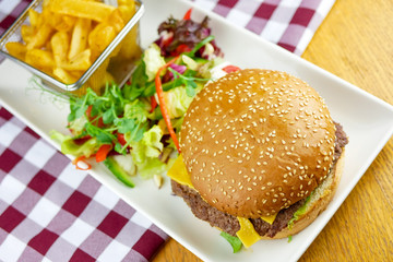 Hamburger and fries on a table