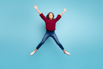 Full length body size photo of cheerful curly positive preteen shaping star with her legs arms...