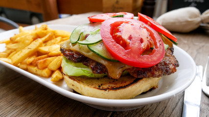 Hamburger and fries on a table