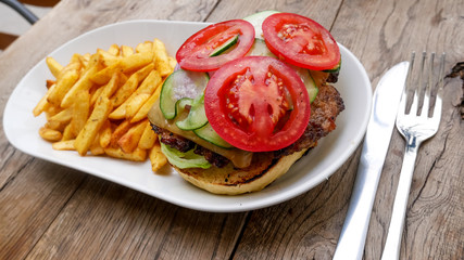 Hamburger and fries on a table
