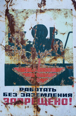 Old rusty construction safety poster
