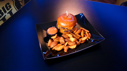 Hamburger and fries on a table