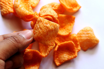 Orange snack made from fried wheat flour