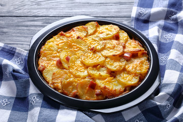 creamy rich scalloped potatoes with ham, top view