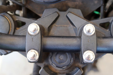 Parts of motorbikes. Components of a car that has metal.