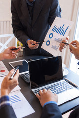 Business people are explaining financial and business profits for business partners. Meetings to...
