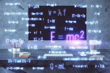 Desktop computer background and formula hologram writing. Double exposure. Education concept.