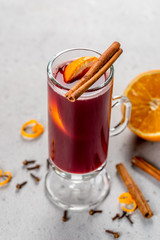 Mulled wine in a transparent glass goblet