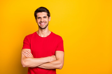 Portrait of content imposing guy cross hands enjoy spring time rest relax wear good looking outfit isolated over yellow color background