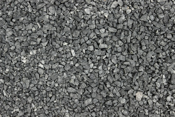 Light gray gravel texture background pattern with various sizes little stones