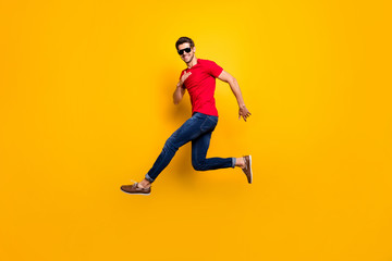 Fototapeta na wymiar Full body photo of cheerful content guy jump enjoy spring free time holidays wear good looking outfit sneakers isolated over bright color background