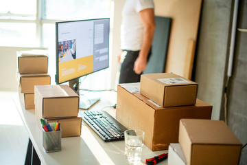 Delivery service, working in warehouse with packages	