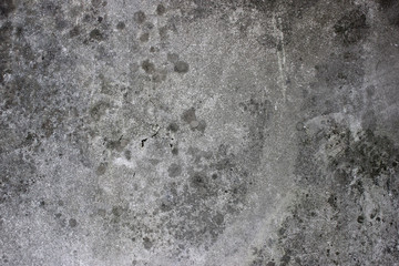 Dirty old concrete wall with some mold spots background texture