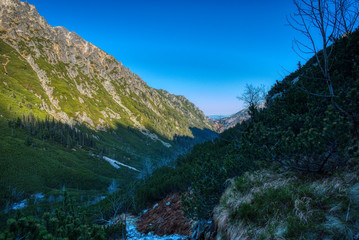 A valley in the mountains with a river protruding on Wednesday in the autumn without people, Poland dolina roztoki © Martin