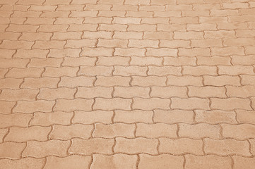 Fototapeta premium Old road red mosaic pavement texture