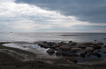 Fototapeta na wymiar Ainazi Latvia, coastal scene at dusk on an overcast day