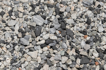 The background of black and white stones lacked a small, neatly arranged on the ground.