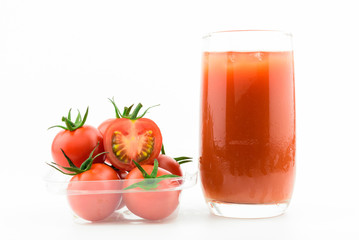 Red fresh tomatoes juice isolated on white background