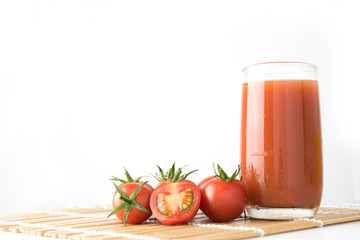 Red fresh tomatoes juice isolated on white background