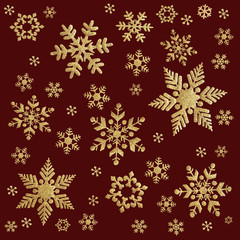 Winter. Golden Christmas snowflakes on a red background