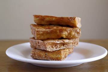 Stack of freshly fried tokwa or tofu