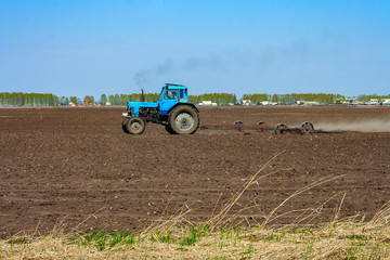 Tractor on spring field work