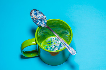 spoon and cup with microplastics