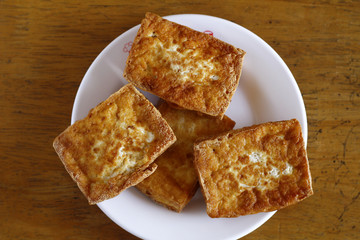 Stack of freshly fried tokwa or tofu