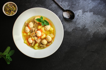 soup meatballs (poultry, chicken, turkey, vegetables) menu concept. food background. top view. copy space