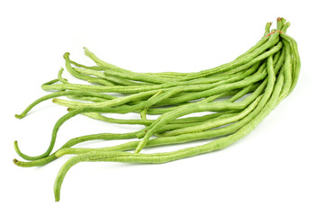 fresh Yard long beans or Chinese Long Beans (Vigna unguiculata subsp. sesquipedalis) isolated on a white background.Vegetables