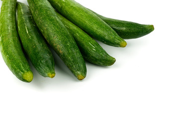 Snake gourd, Serpent gourd, Chichinda, Trichosanthes anguina Linn or cucumerina Isolated on white background. food ingredient and Healthy food for slow down aging
