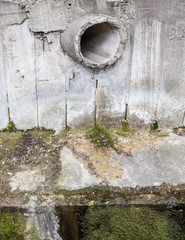 Concrete run-off pipe.