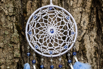Handmade dream catcher with feathers threads and beads rope hanging