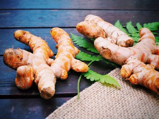 Top view of vegetables or herbs with on wooden table