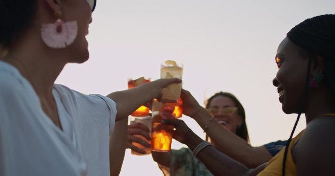 Young students with cocktail glasses during a party