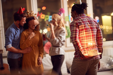 Fototapeta premium friends celebrating Surprise Birthday party