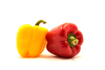Ripe beautiful vegetables, paprika on a white background