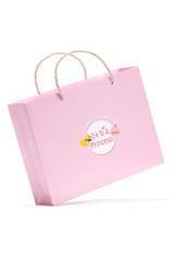 Subject shot of a pink gift bag with silky plaited handles and decorated with a childish print with...