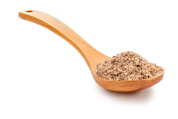 Fine white salt with tomato and garlic in wooden spoon (salt varieties collection). Isolated on white background. Rustic appearance.