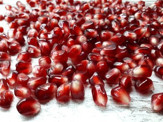 close-up of a large juicy burgundy sweet ripe pomegranate fruit