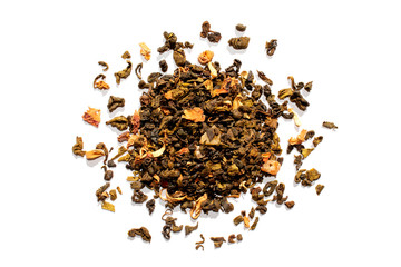 Dried tea leaves isolated on white background. Mix of black tea with fruits. 