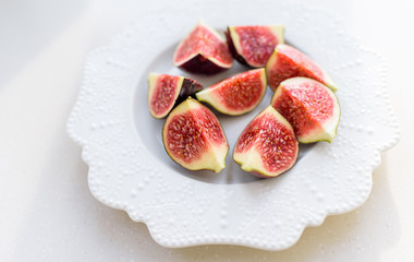 chopped figs on a white ceramic plate