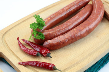 several merguez on a cutting board